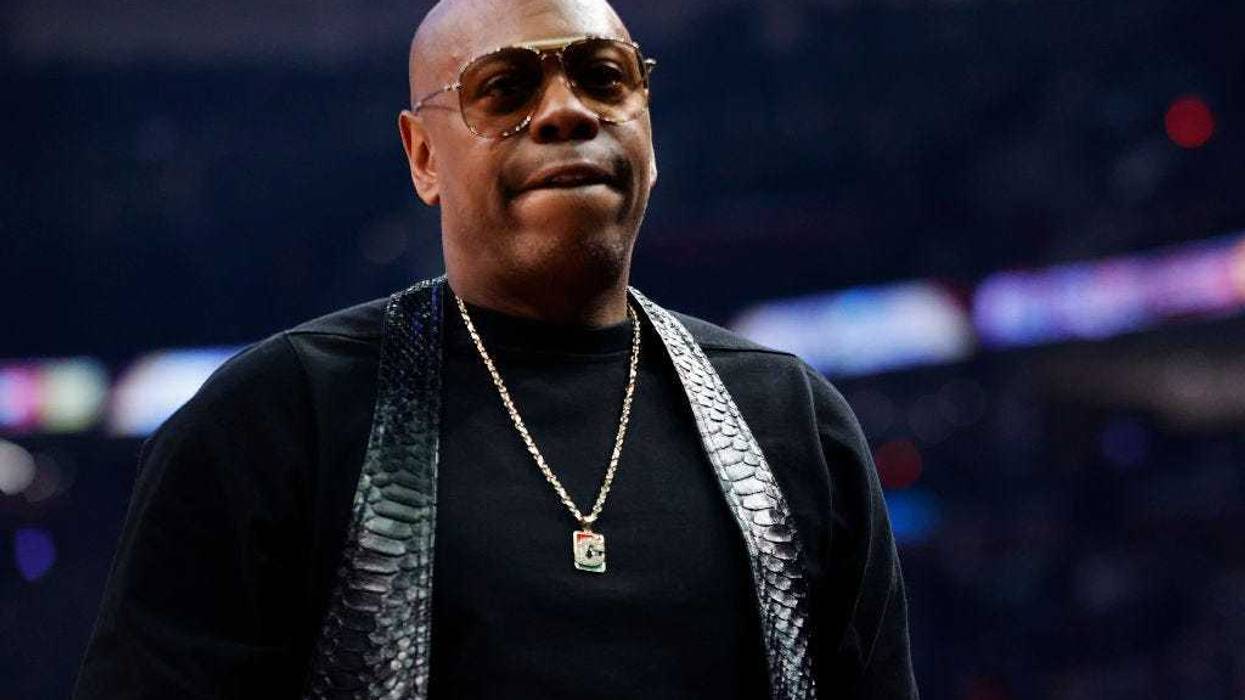 Dave Chappelle looks on during the 2022 NBA All-Star Game at Rocket Mortgage Fieldhouse on February 20, 2022 in Cleveland, Ohio.