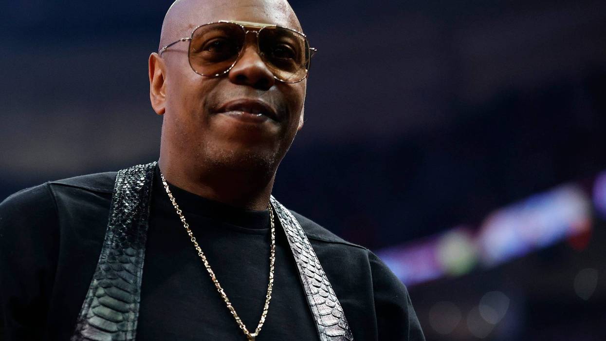 Dave Chappelle looks on during the 2022 NBA All-Star Game at Rocket Mortgage Fieldhouse on February 20, 2022 in Cleveland, Ohio.