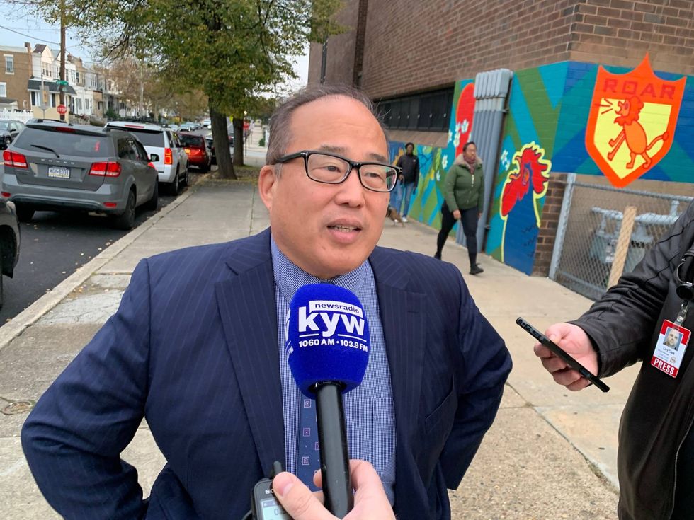 David Oh speaks before voting at W.C. Longstreth Elementary School in Southwest Philadelphia, Nov. 7, 2023.