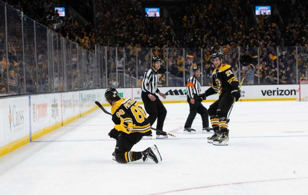David Pastrnak scores his third goal of Game 1
