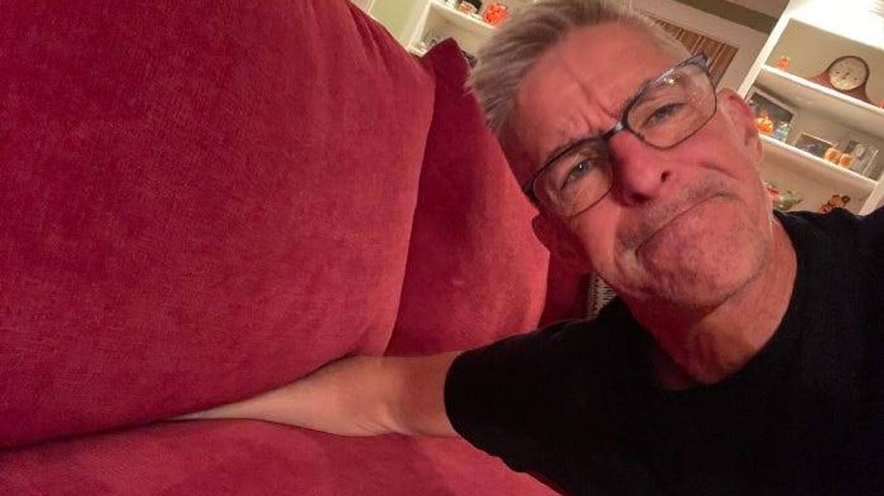 David Reaching Into His Couch