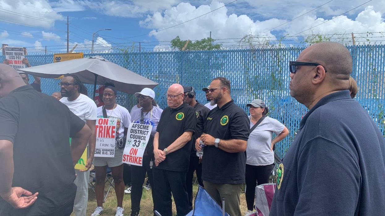 DC 33 President Greg Boulware with striking workers on Monday, July 7, 2025.