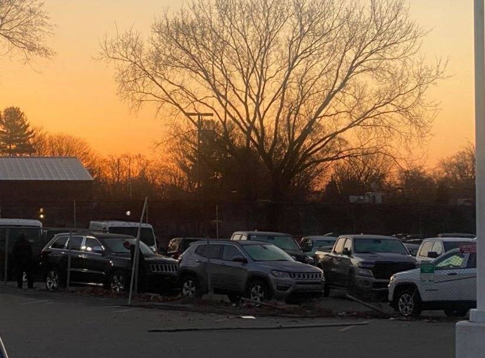 Dealership with broken fence