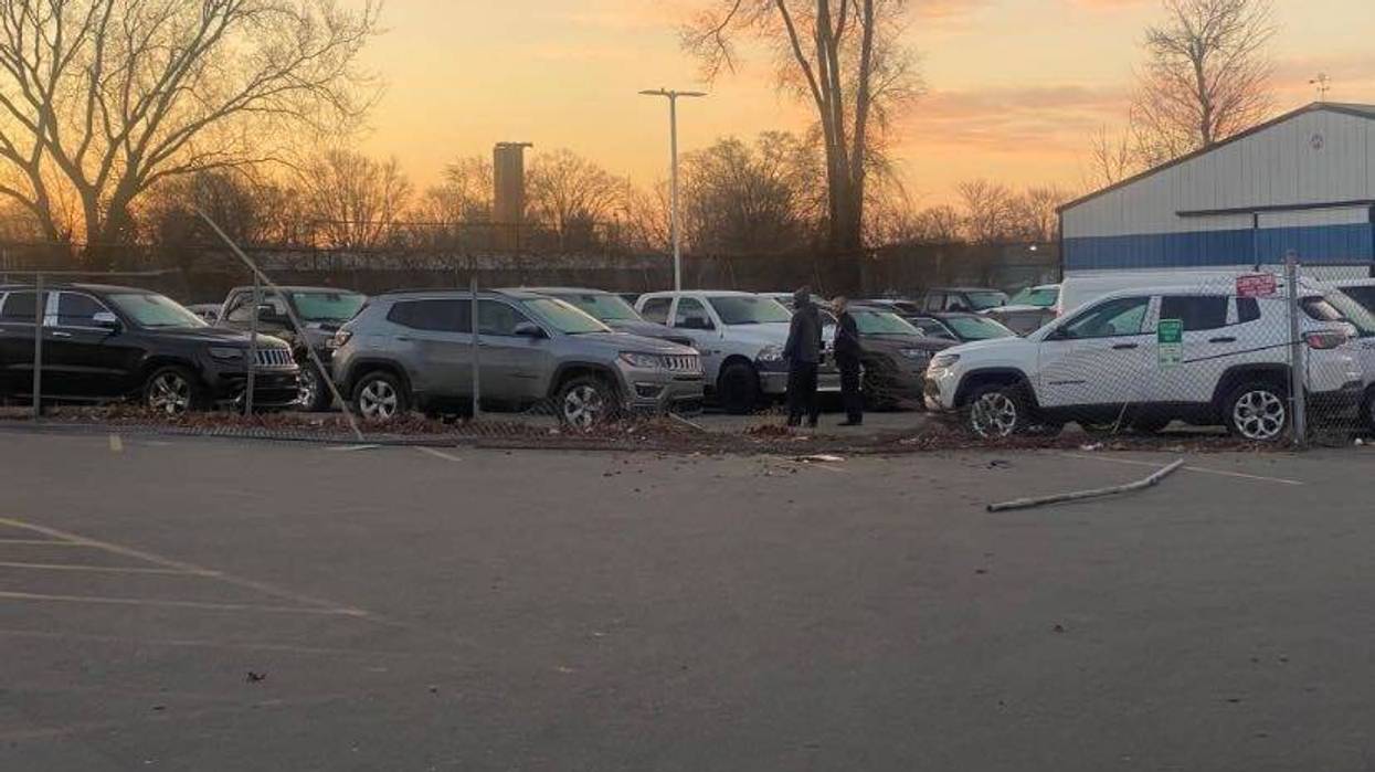 Dealership with broken fence