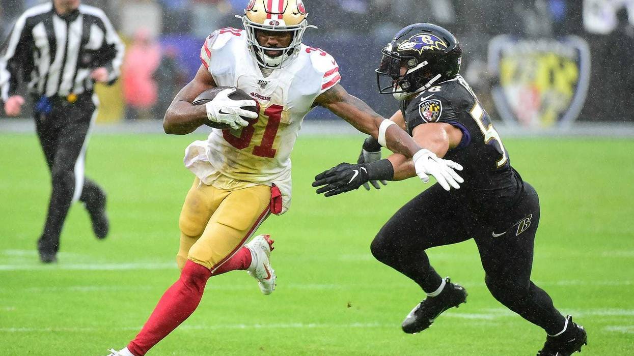 Dec 1, 2019; Baltimore, MD, USA; San Francisco 49ers running back Raheem Mostert (31) runs with the ball while being pursued by Baltimore Ravens linebacker L.J. Fort (58) in the second quarter at M&T Bank Stadium. Mandatory Credit: Evan Habeeb-USA TODAY S