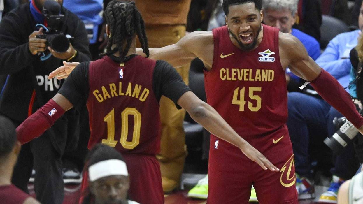 Dec 1, 2024; Cleveland, Ohio, USA; Cleveland Cavaliers guard Darius Garland (10) and guard Donovan Mitchell (45) celebrate a win over the Boston Celtics at Rocket Mortgage FieldHouse.