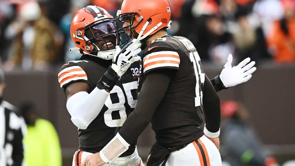 Dec 10, 2023; Cleveland, Ohio, USA; Cleveland Browns tight end David Njoku (85) and quarterback Joe Flacco (15) celebrate after Flacco threw a touchdown pass to wide receiver David Bell (not pictured) during the second half against the Jacksonville Jaguars at Cleveland Browns Stadium. Mandatory Credit: Ken Blaze-USA TODAY Sports