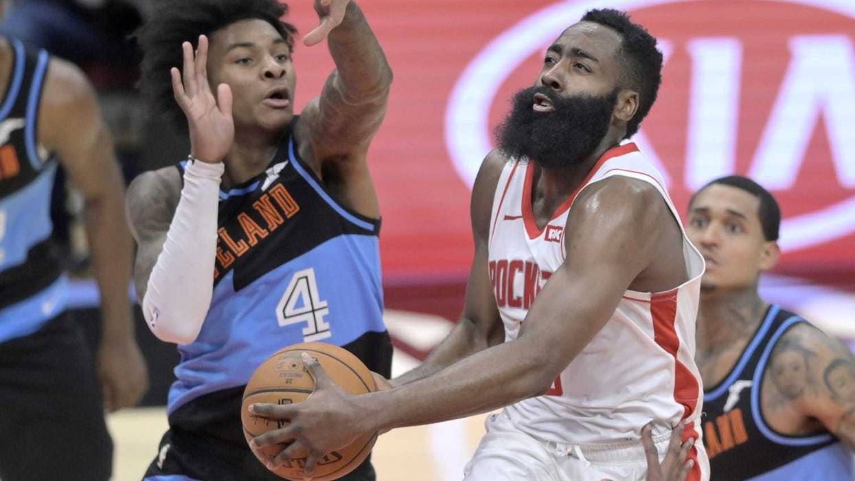 Dec 11, 2019; Cleveland, OH, USA; Houston Rockets guard James Harden (13) drives against Cleveland Cavaliers guard Kevin Porter Jr. (4) in the third quarter at Rocket Mortgage FieldHouse. Mandatory Credit: David Richard-USA TODAY Sports