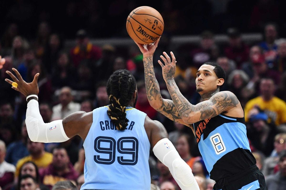 Dec 20, 2019; Cleveland, OH, USA; Cleveland Cavaliers guard Jordan Clarkson (8) looks to pass against the defense of Memphis Grizzlies forward Jae Crowder (99) during the first half at Rocket Mortgage FieldHouse. Mandatory Credit: Ken Blaze-USA TODAY Spor