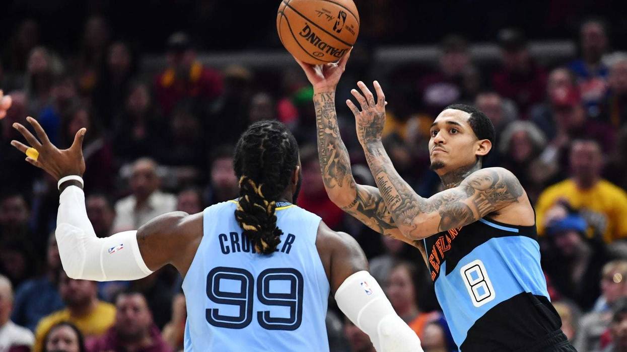 Dec 20, 2019; Cleveland, OH, USA; Cleveland Cavaliers guard Jordan Clarkson (8) looks to pass against the defense of Memphis Grizzlies forward Jae Crowder (99) during the first half at Rocket Mortgage FieldHouse. Mandatory Credit: Ken Blaze-USA TODAY Spor