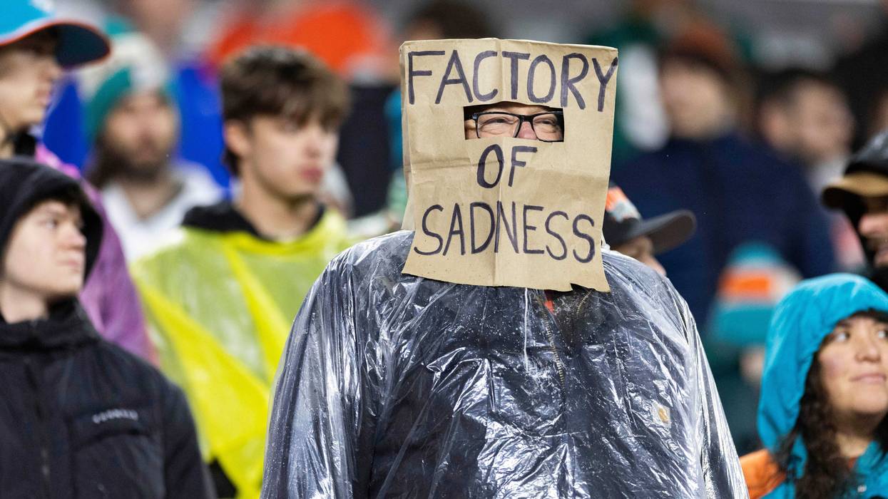 Dec 29, 2024; Cleveland, Ohio, USA; A Cleveland Browns fan wears a bag over his head during the fourth quarter against the Miami Dolphins at Huntington Bank Field.