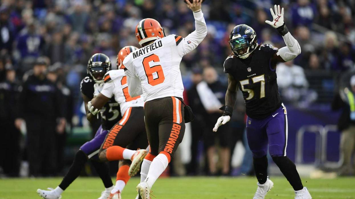 Dec 30, 2018; Baltimore, MD, USA; Cleveland Browns quarterback Baker Mayfield (6) throws as Baltimore Ravens inside linebacker C.J. Mosley (57) rushes during the first quarter at M&T Bank Stadium. Mandatory Credit: Tommy Gilligan-USA TODAY Sports