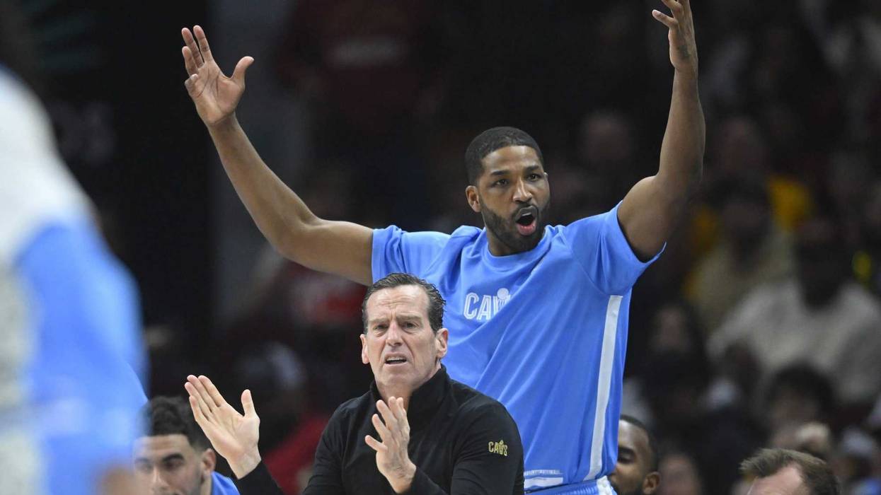 Dec 5, 2024; Cleveland, Ohio, USA; Cleveland Cavaliers head coach Kenny Atkinson and center Tristan Thompson (13) celebrate in the second quarter against the Denver Nuggets at Rocket Mortgage FieldHouse.