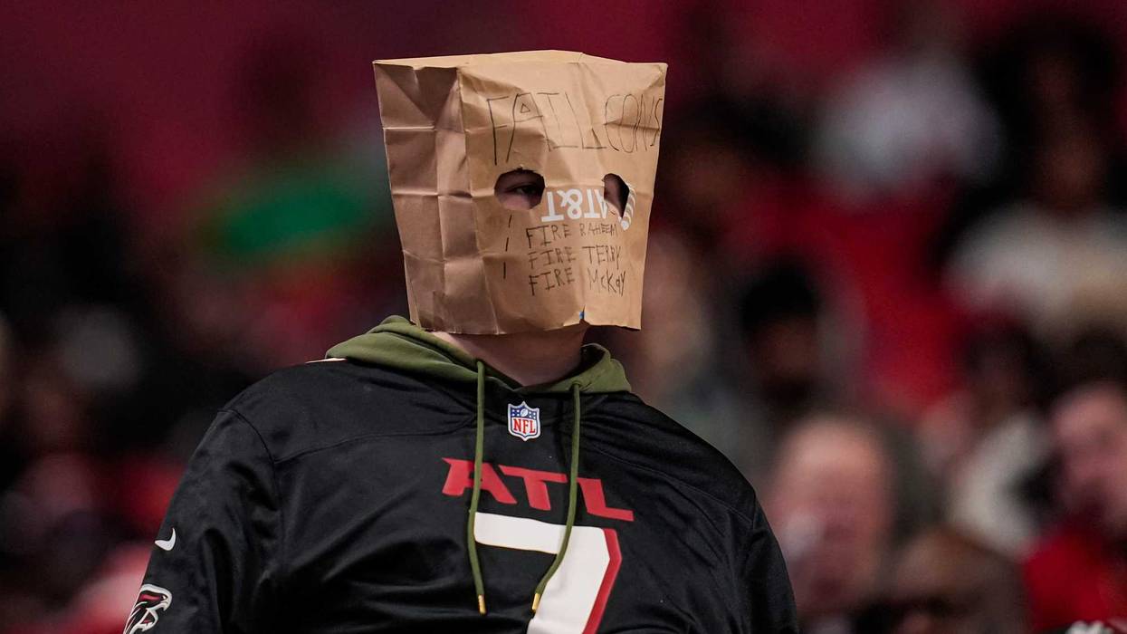 Dec 7, 2025; Atlanta, Georgia, USA; A fan in the stands during the game between the Atlanta Falcons against the Seattle Seahawks at Mercedes-Benz Stadium. Mandatory Credit: Dale Zanine-Imagn Images