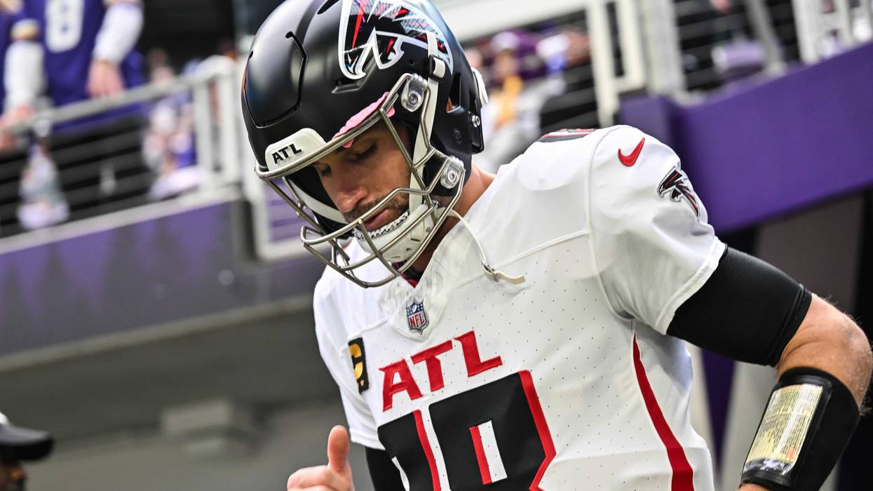 Dec 8, 2024; Minneapolis, Minnesota, USA; Atlanta Falcons quarterback Kirk Cousins (18) enters the field before the game against the Minnesota Vikings at U.S. Bank Stadium. Mandatory Credit: Jeffrey Becker-Imagn Images