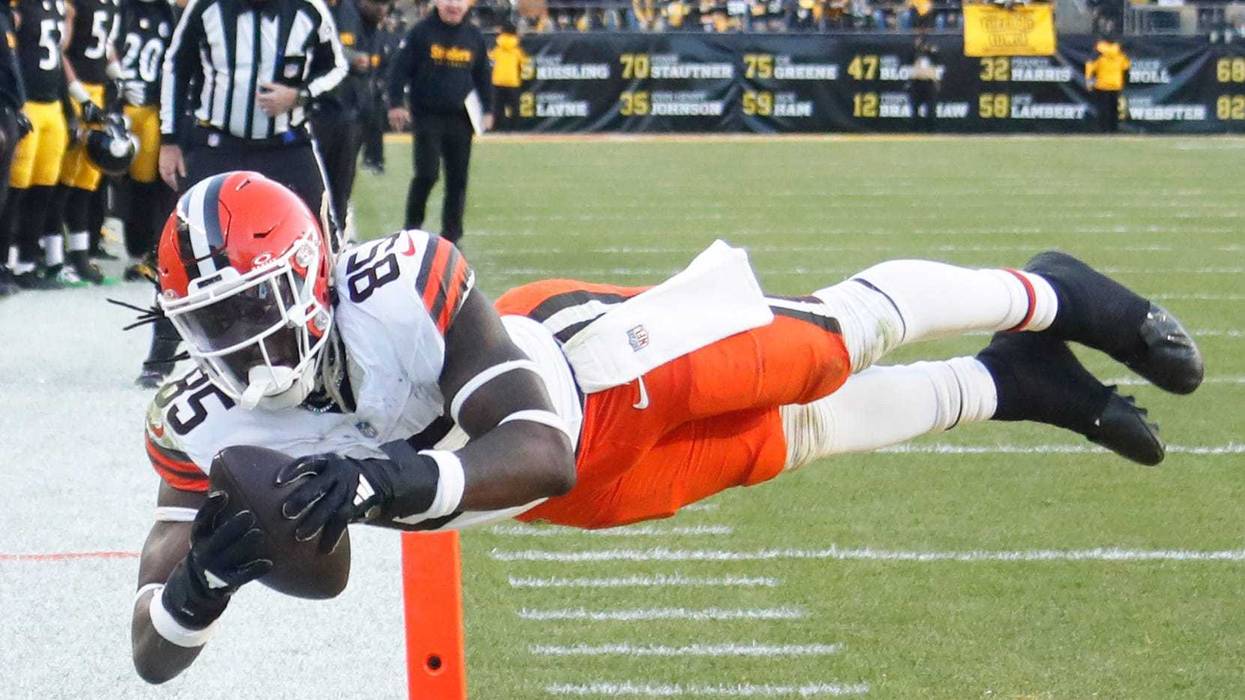Dec 8, 2024; Pittsburgh, Pennsylvania, USA; Cleveland Browns tight end David Njoku (85) dives into the end-zone to score a touchdown against the Pittsburgh Steelers during the fourth quarter at Acrisure Stadium.