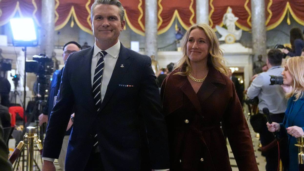 Defense Secretary Pete Hegseth and his wife Jennifer Rauchet arrive before President Donald Trump delivers the State of the Union address to a joint session of Congress in the House chamber at the U.S. Capitol in Washington, Tuesday, Feb. 24, 2026.