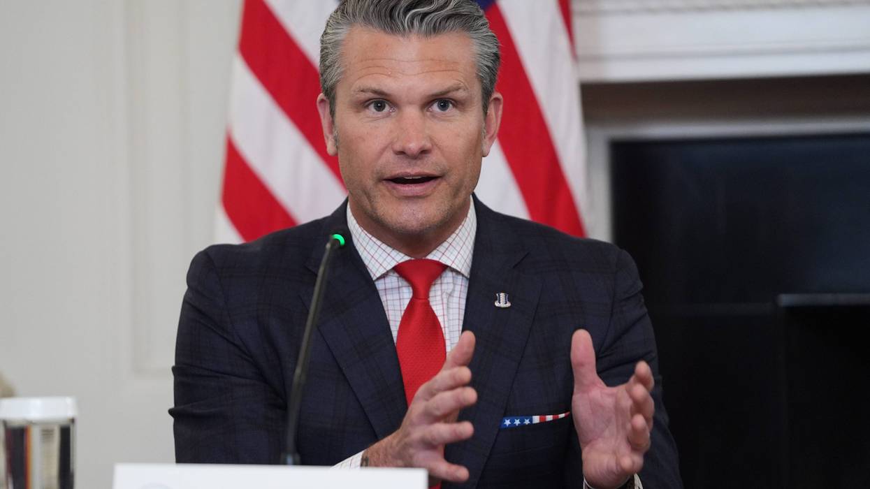 Defense Secretary Pete Hegseth answers a question from a reporter during a roundtable on criminal cartels in the State Dining Room of the White House, Thursday, Oct. 23, 2025, in Washington.