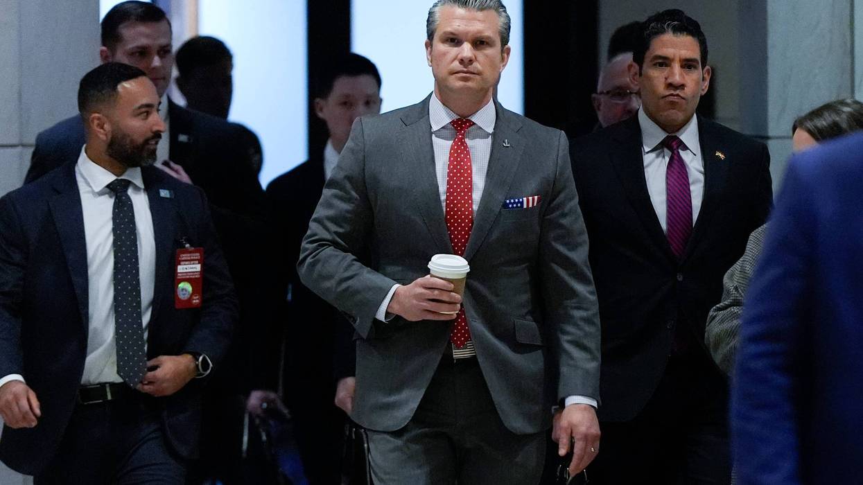 Defense Secretary Pete Hegseth arrives to brief members of Congress on military strikes near Venezuela, Tuesday, Dec. 16, 2025, at the Capitol in Washington.