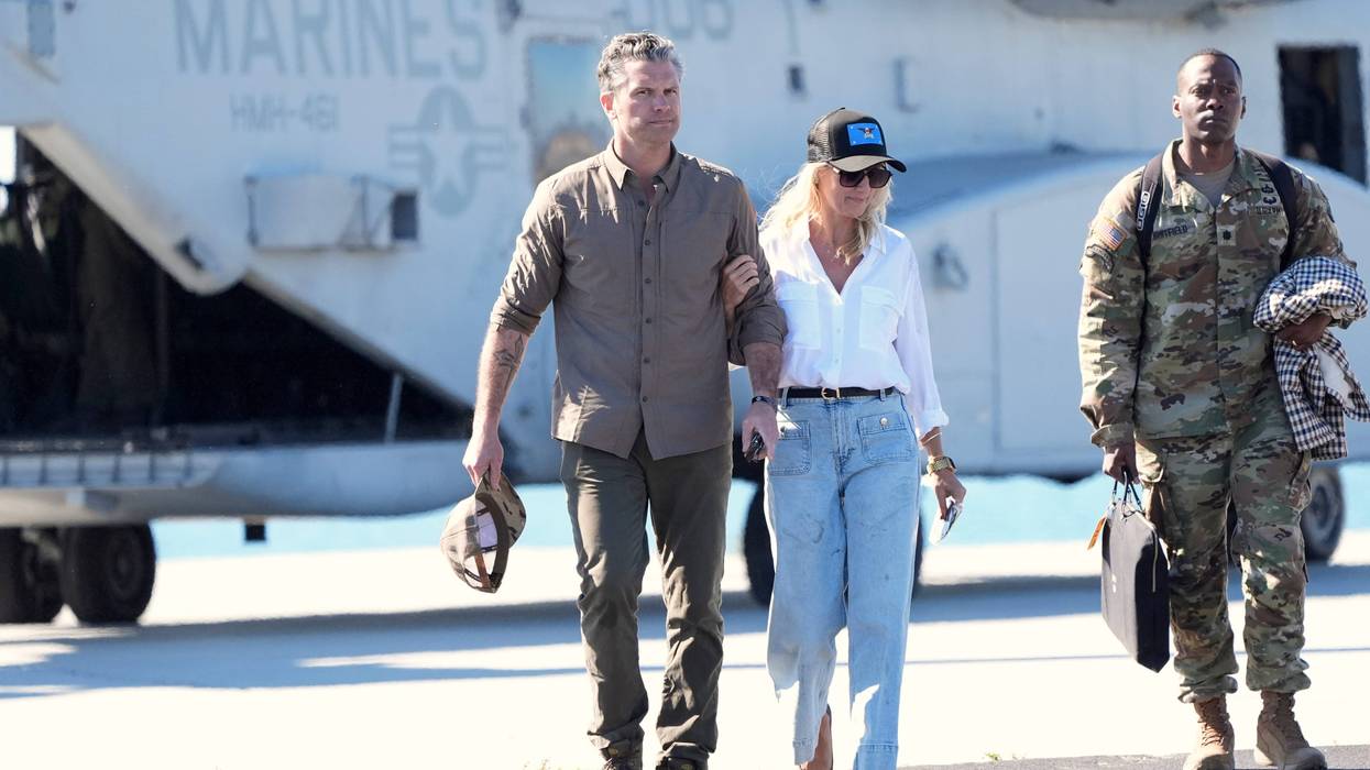Defense Secretary Pete Hegseth, from left, and his wife Jennifer Rauchet walk during activities to mark the upcoming Marine Corps' 250th anniversary Saturday, Oct 18, 2025, on Marine Corps Base Camp Pendleton in Camp Pendleton, Calif.