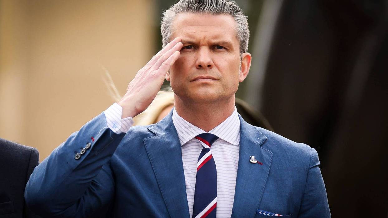 Defense Secretary Pete Hegseth salutes during a ceremony at the US cemetery to commemorate the 81st anniversary of the D-Day landings, Friday, June 6, 2025 in Colleville-sur-Mer, Normandy.