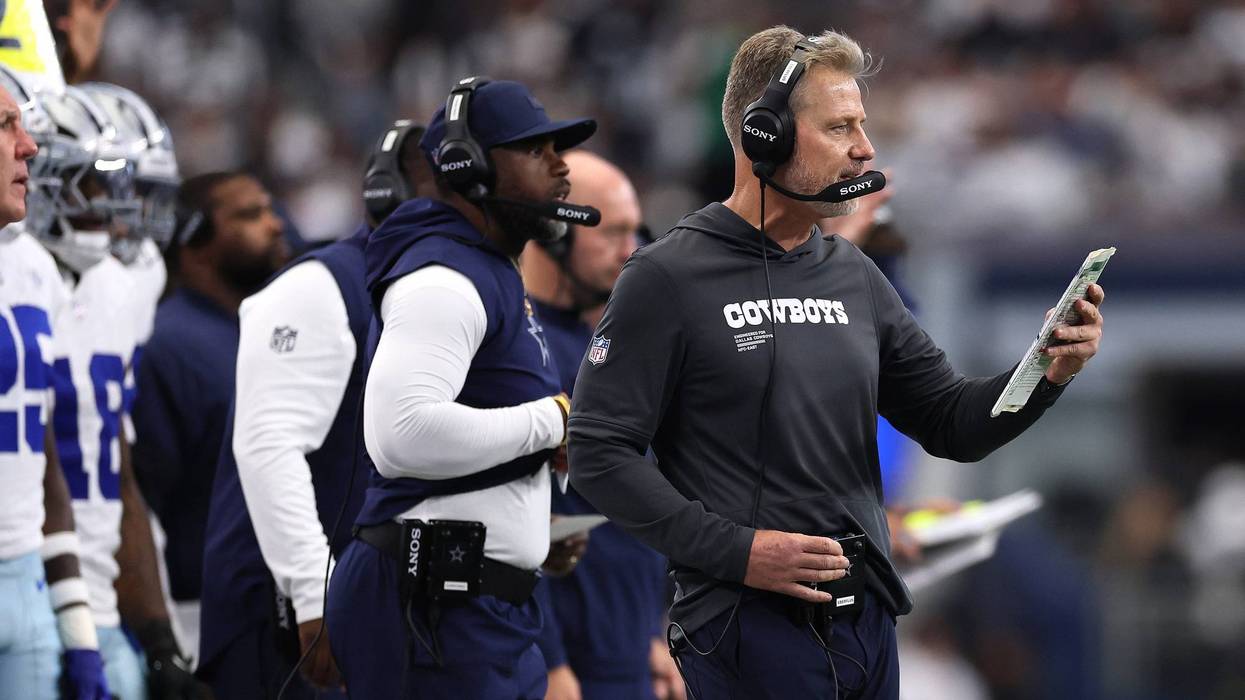 Defensive coordinator Matt Eberflus of the Dallas Cowboys makes adjustments during the game against the New York Giants at AT&T Stadium on Sep. 14, 2025 in Arlington, Texas.