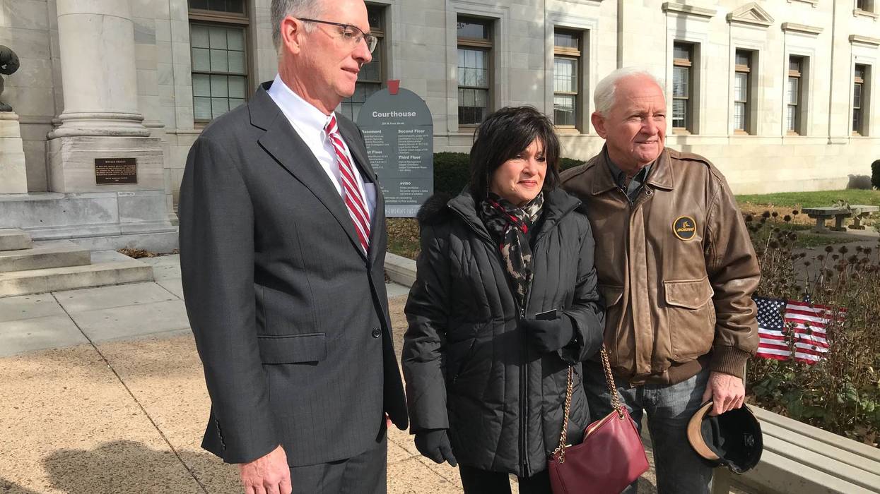Delaware County Prosecutor Daniel McDevitt, with Rosann DeRsa and Richard DeRosa, parents of Deana Eckman.