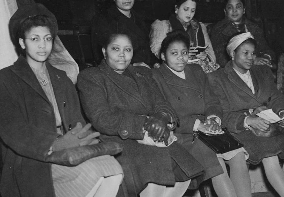 Delegates from all over the world at a meeting to celebrate International Women