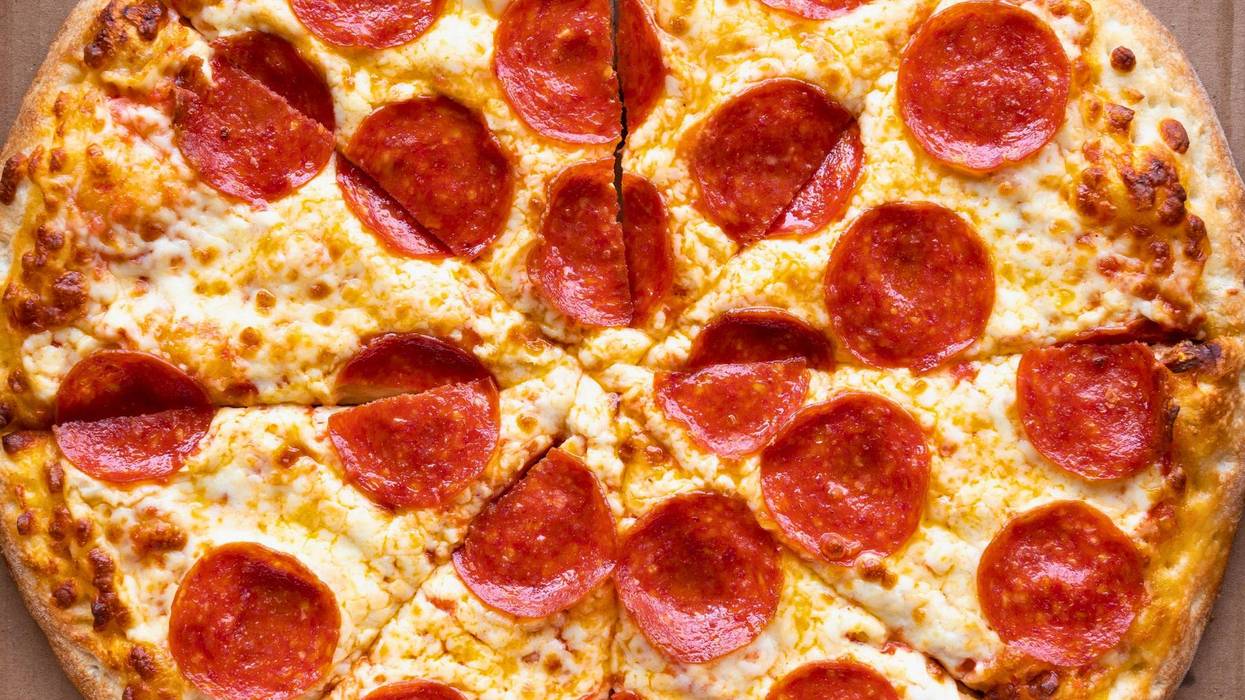 Delicious pepperoni pizza with golden crust and melted cheese