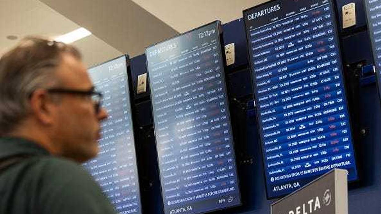 Delta Airlines flights status are displayed for passengers at Hartsfield-Jackson Atlanta International Airport on July 22, 2024 in Atlanta, Georgia.