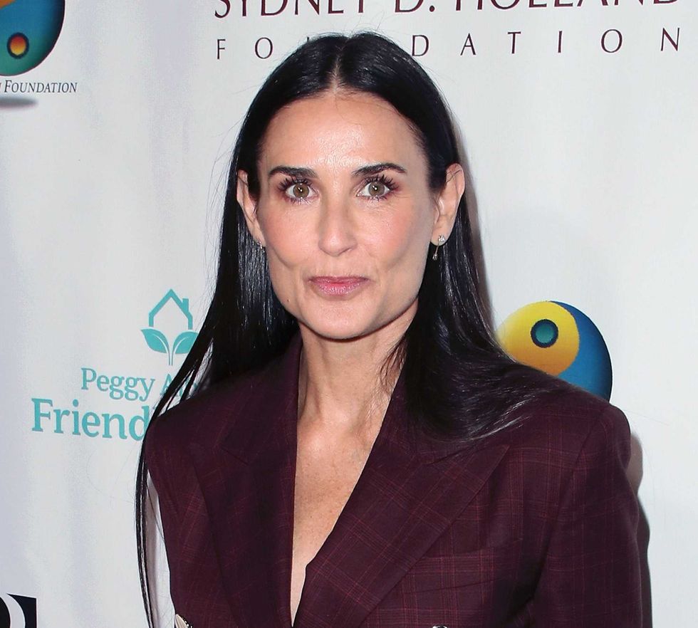 Demi Moore, 58, soars to new heights jumping on a yacht in striped bikini: ‘Leaping into fall!’