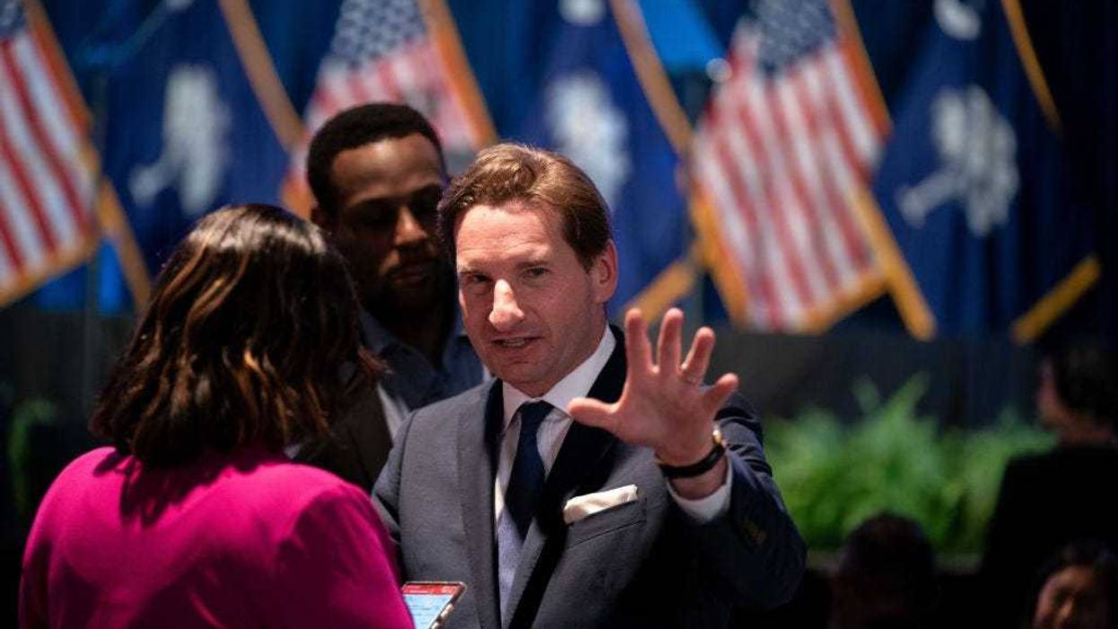 Democratic challenger U.S. Rep. Dean Phillips talks with people during the South Carolina Democratic Party First in the Nation Celebration and dinner at the state fairgrounds on January 27, 2024 in Columbia, South Carolina.