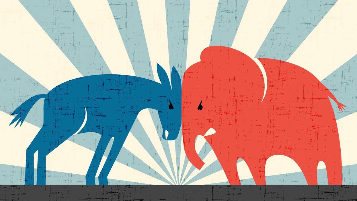 Democratic donkey and Republican elephant butting heads