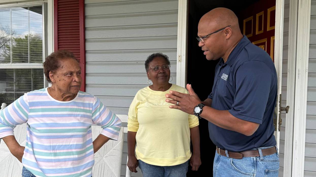 Democratic House candidate Shawn Harris talks with voters in Rome, Ga., on Thursday, March 26, 2026.