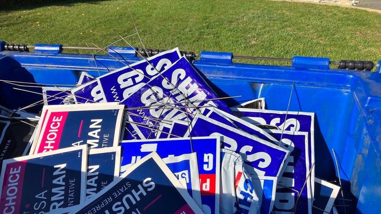 Democratic political candidates' yard signs which were reportedly stolen and placed in a dumpster in Chester County.