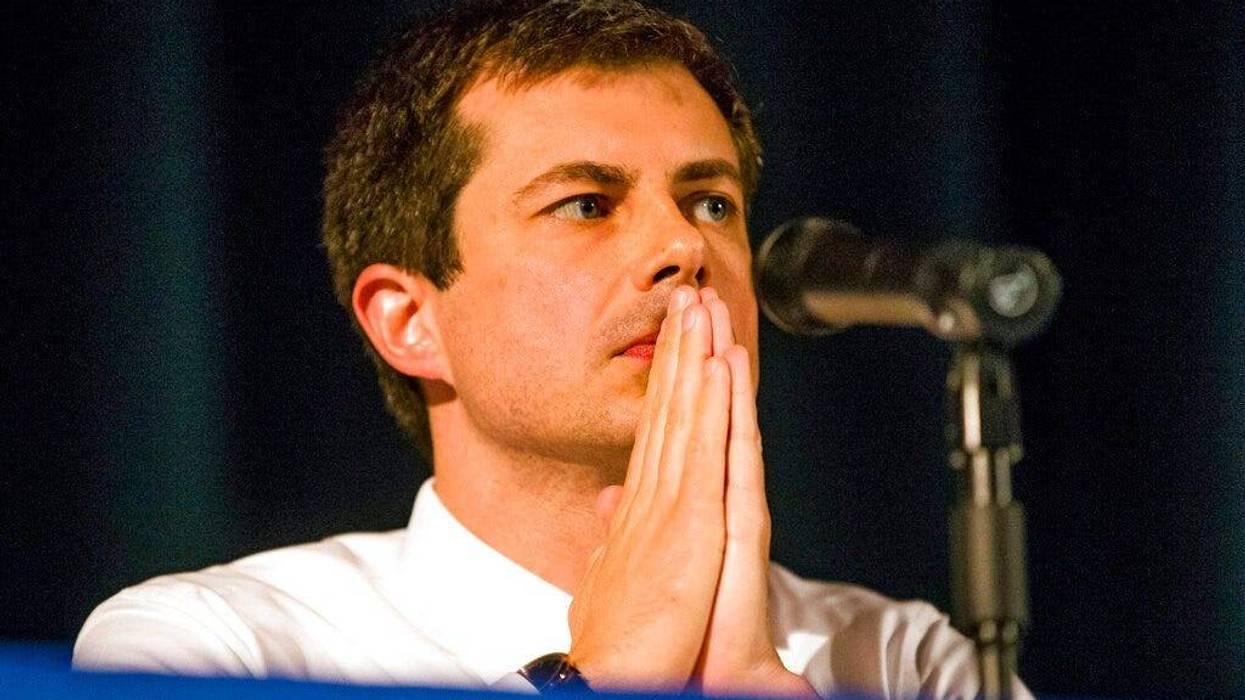 Democratic presidential candidate and South Bend Mayor Pete Buttigieg looks on during a town hall community meeting