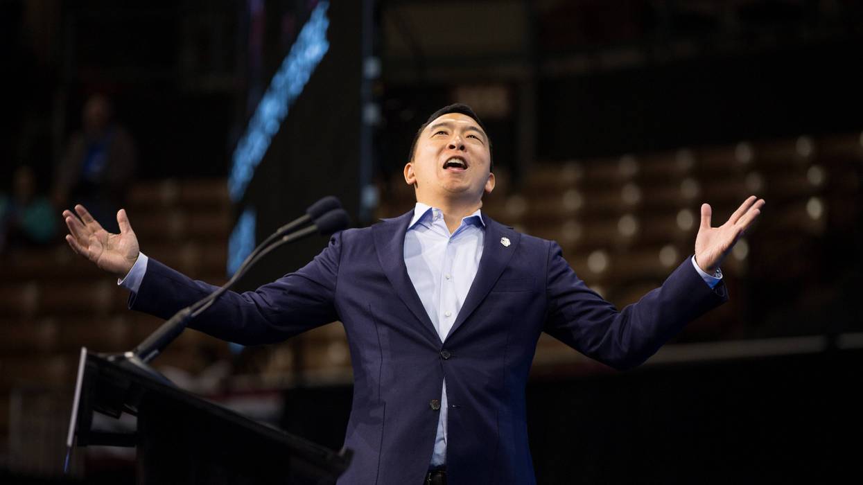 Democratic presidential candidate, entrepreneur Andrew Yang reacts as he goes on stage during the New Hampshire Democratic Party Convention