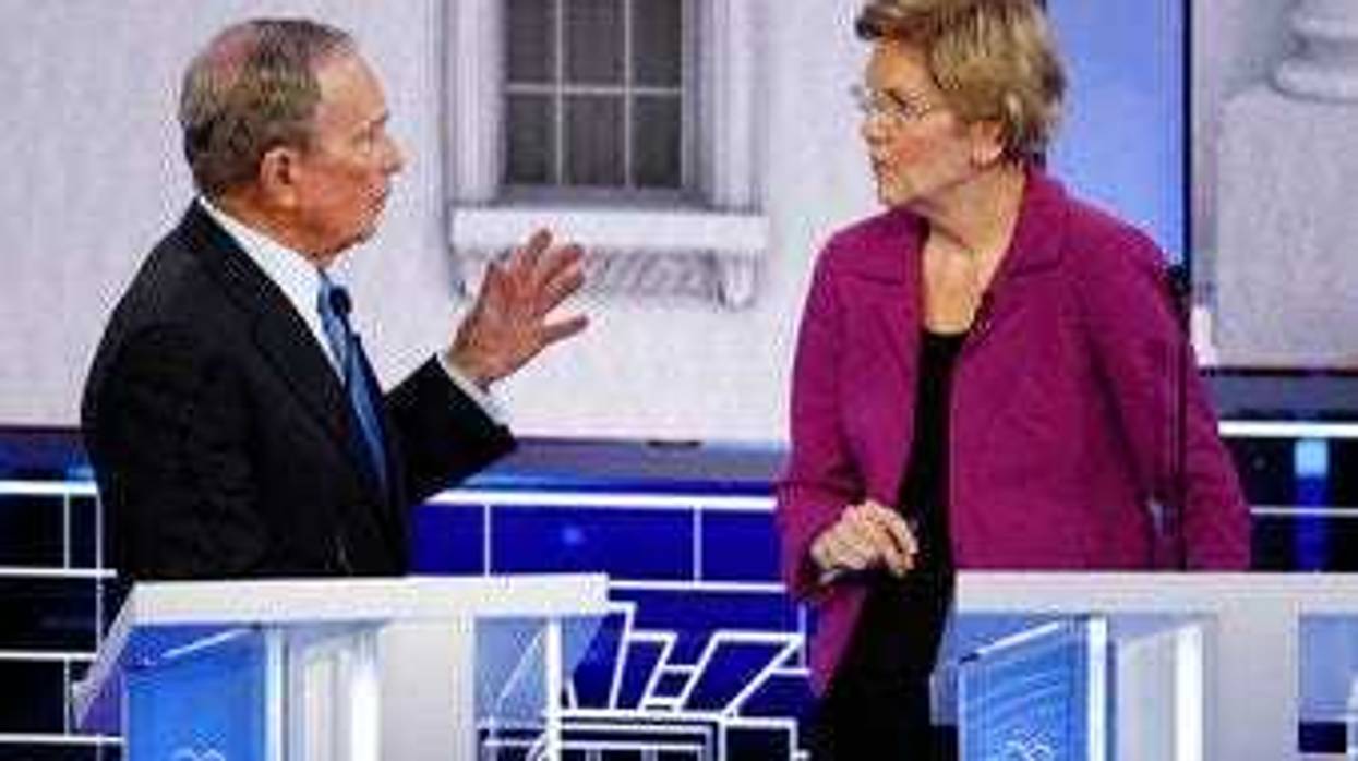 Democratic presidential candidate, former New York City Mayor Mike Bloomberg talks with Sen. Elizabeth Warren, D-Mass., during a break at a Democratic presidential primary debate Wednesday, Feb. 19, 2020, in Las Vegas. (AP Photo/John Locher)