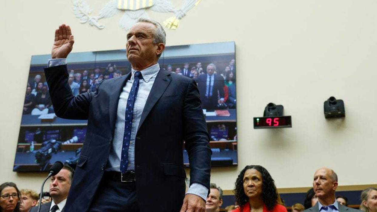 Democratic presidential candidate Robert F. Kennedy Jr. holds his right hand up as he is sworn in for a hearing with the House Judiciary Subcommittee on the Weaponization of the Federal Government on Capitol Hill on July 20, 2023 in Washington, DC. Members of the committee held the hearing to discuss instances of the U.S. government's alleged censoring of citizens, political figures and journalists. (Photo by Anna Moneymaker/Getty Images)