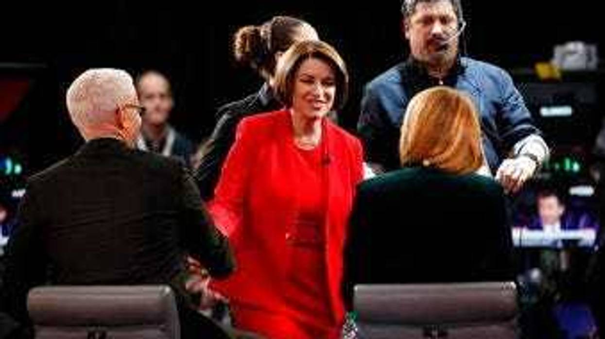 Democratic presidential candidate Sen. Amy Klobuchar, D-Minn., prepares to be interviewed in the spin room Tuesday, Jan. 14, 2020, after a Democratic presidential primary debate. (AP Photo/Charlie Neibergall)