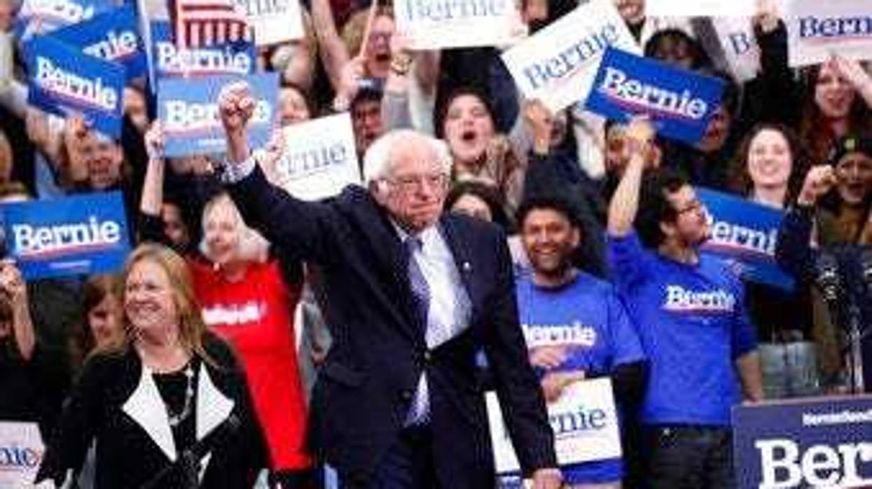 Democratic presidential candidate Sen. Bernie Sanders, I-Vt., with his wife Jane O'Meara Sanders, arrives to speak to supporters at a primary night election rally in Manchester, N.H., Tuesday, Feb. 11, 2020. (AP Photo/Pablo Martinez Monsivais)