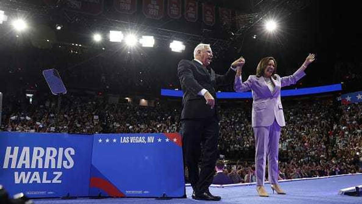 Democratic presidential candidate, U.S. Vice President Kamala Harris (R) and Democratic vice presidential candidate Minnesota Governor Tim Walz (L) appear at a campaign rally at the University of Las Vegas Thomas & Mack Center on August 10, 2024 in Las Vegas, Nevada.