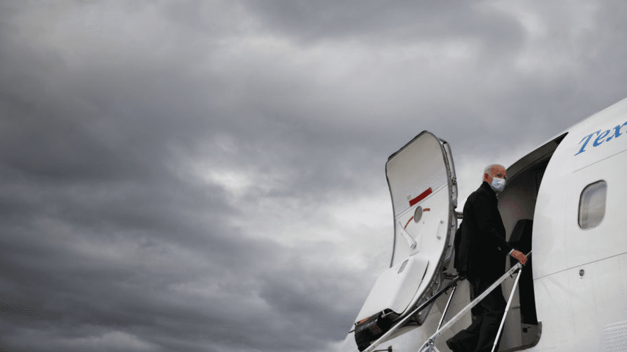 Democratic presidential nominee Joe Biden boards his plane at Gerald Ford Airport after campaigning October 02, 2020.