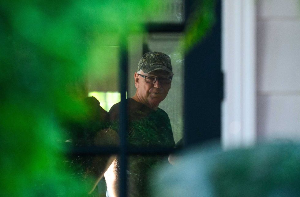 Democratic vice presidential nominee Minnesota Gov. Tim Walz prepares to depart from his temporary governors residence for a campaign rally in Philadelphia on Aug. 6, 2024 in St Paul, Minnesota