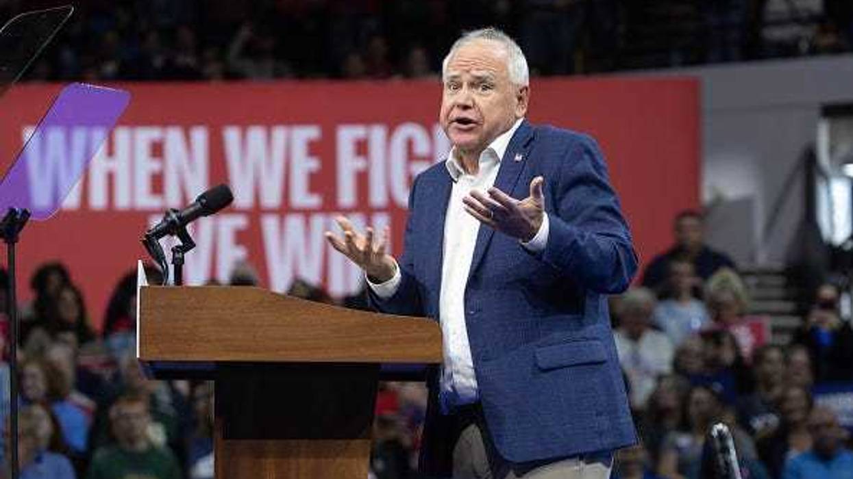 Democratic vice presidential nominee, Minnesota Gov. Tim Walz speaks at a get-out-the-vote rally on October 22, 2024 in Madison, Wisconsin. Wisconsin polls open today for in-person early voting.