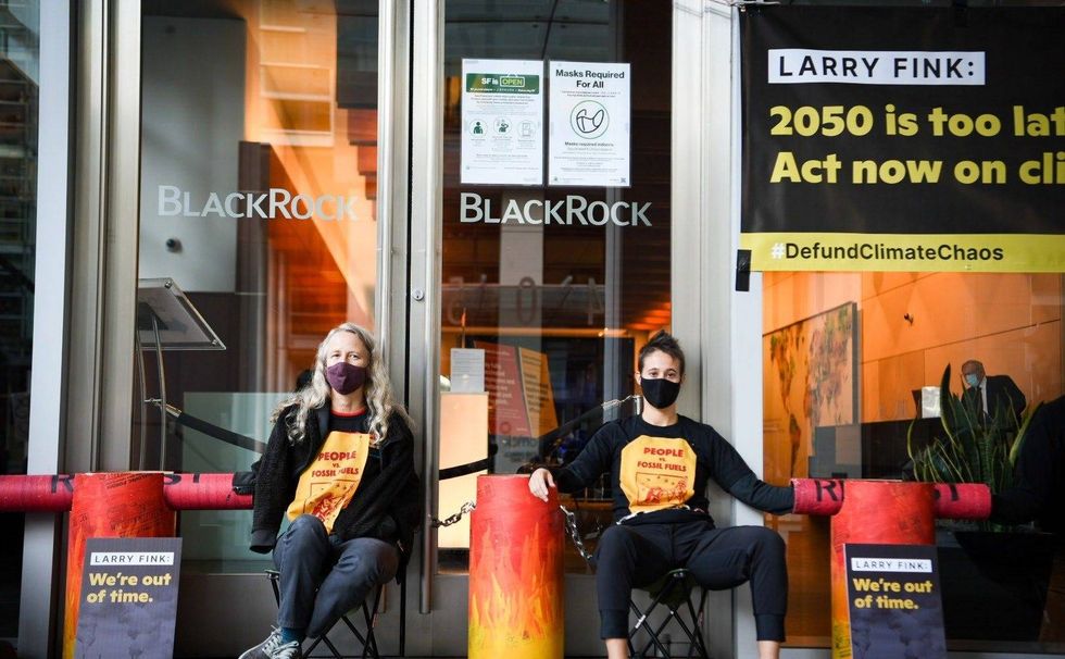 Demonstrators block the entrance to BlackRock
