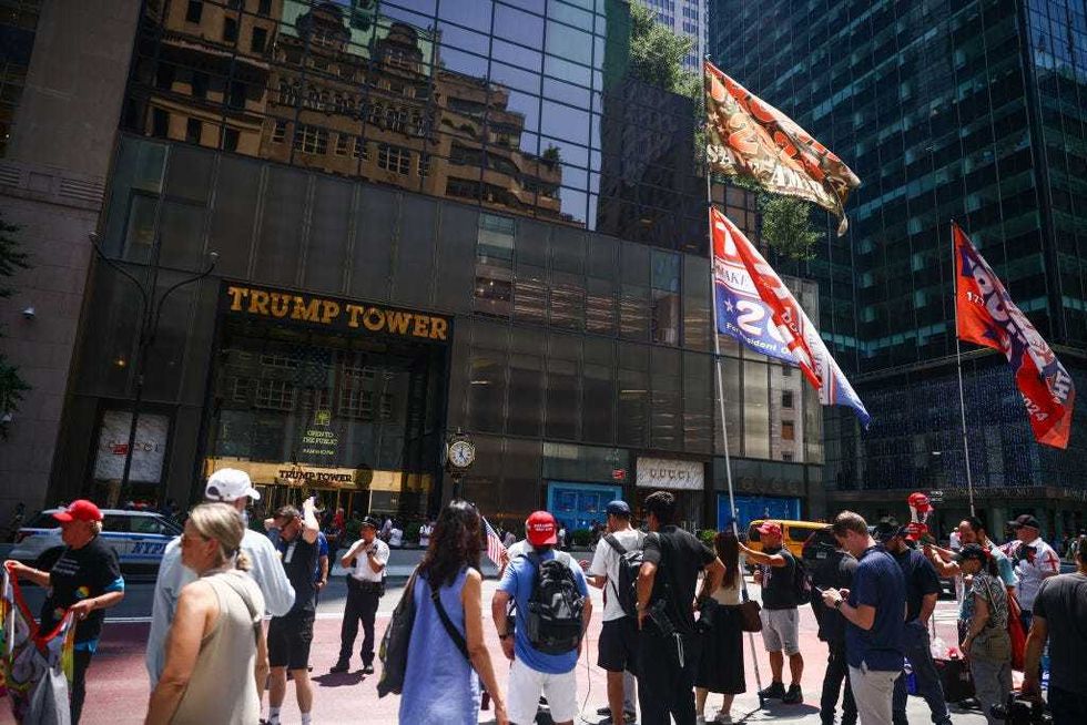 Demonstrators gather in front of Trump Tower a day after the former U.S. President has been injured during shooting at campaign rally in Butler, Pennsylvania.