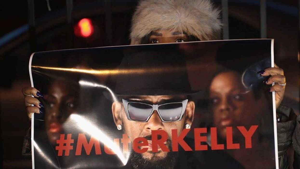 Demonstrators gather near the studio of singer R. Kelly to call for a boycott of his music after allegations of sexual abuse against young girls were raised on the highly-rated Lifetime mini-series "Surviving R. Kelly" on Jan. 9, 2019 in Chicago, Illi
