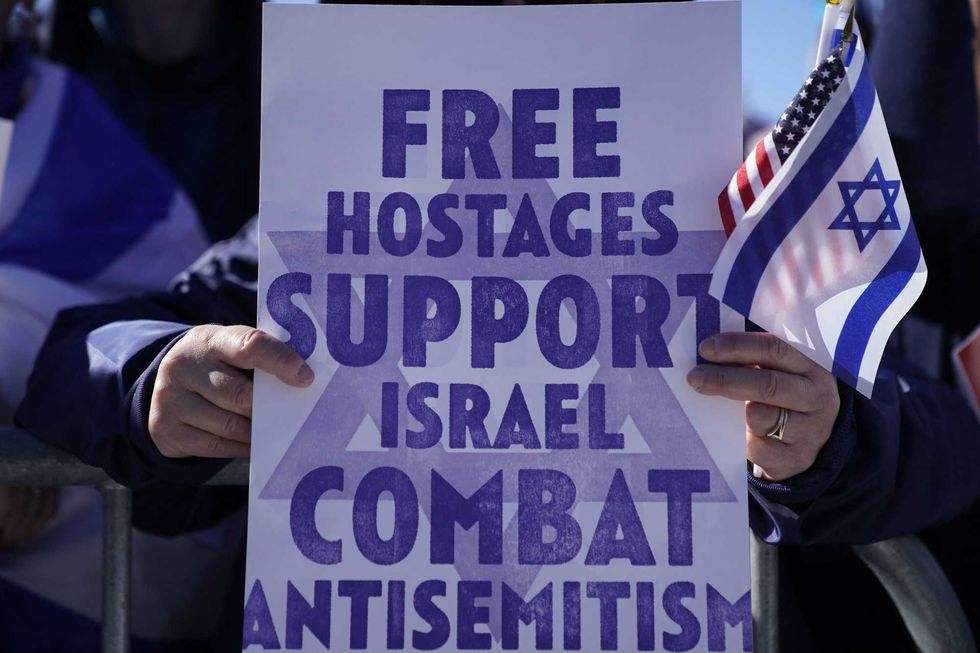 Demonstrators in support of Israel gather to denounce antisemitism and call for the release of Israeli hostages, on the National Mall in Washington, DC, on November 14, 2023.