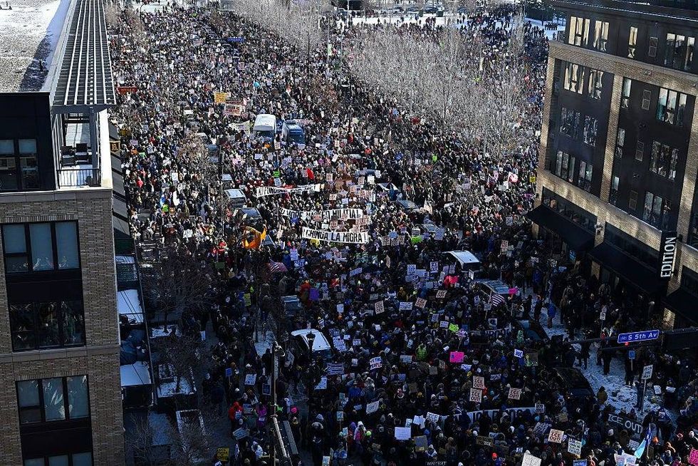 Demonstrators participate in a rally and march during an "ICE Out” day of protest on January 23, 2026 in Minneapolis, Minnesota.